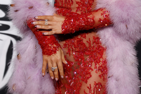 Sabrina Carpenter wears a French manicure with rhinestoned tips at the MTV VMAs.